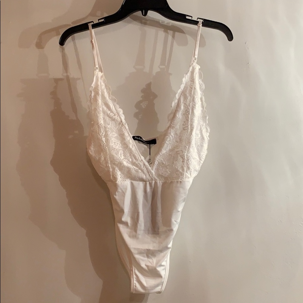 White lace lingerie bodysuit